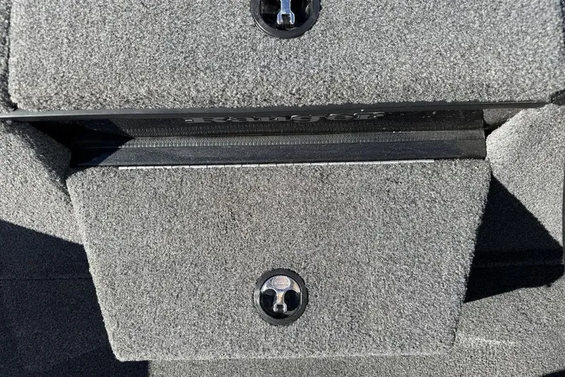 Slide: The Image of 2018 Ranger RT198P boat storage compartments open, showcasing organized interior layout. - 6