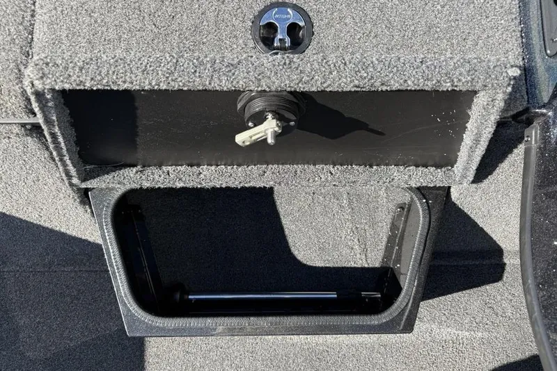 Slide: The Image of 2018 Ranger RT198P boat deck with gray carpet and storage compartments. - 8