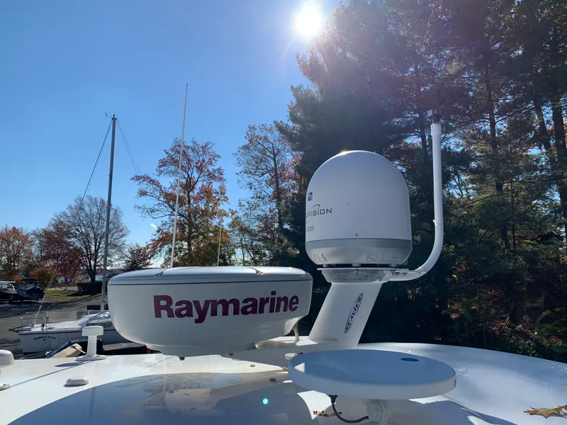 Slide: The Image of Raymarine radar and satellite equipment on a 2009 Regal 4460 boat. - 24