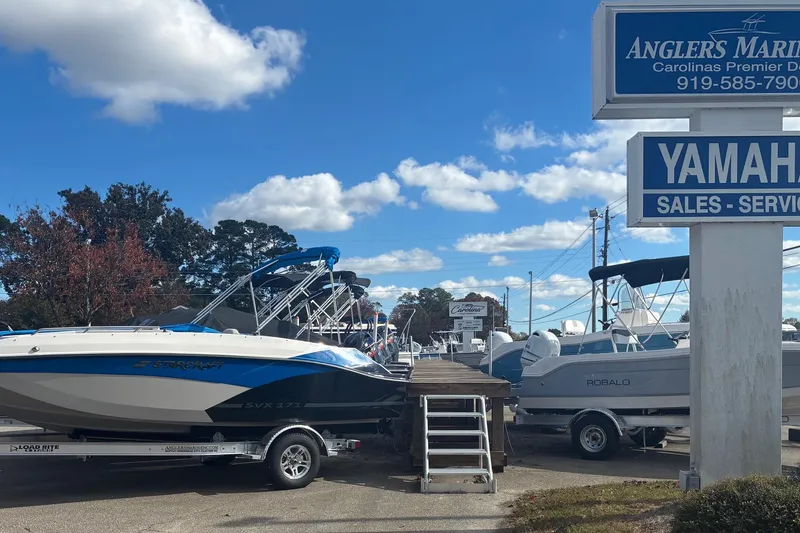 The Image of 2026 Starcraft SVX 171 OB boat at Anglers Marine dealership under blue sky. - 1