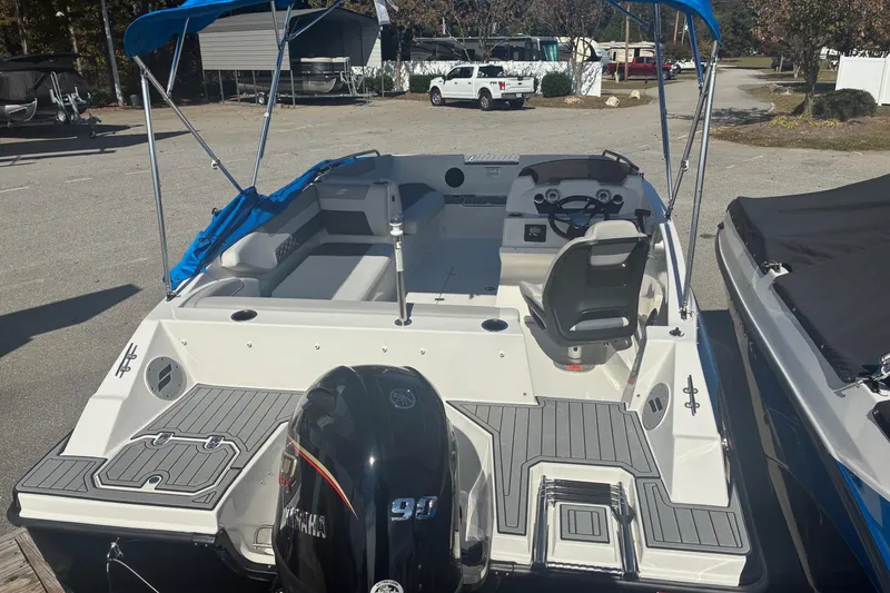 Slide: The Image of 2026 Starcraft SVX 171 OB boat with Yamaha outboard motor, featuring spacious seating and modern design. - 9