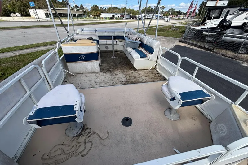 Slide: The Image of 2005 Bentley Pontoons 200 Fish boat interior with seating and open deck. - 13