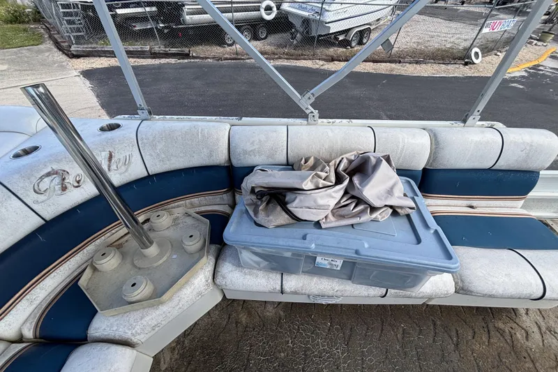 Slide: The Image of 2005 Bentley Pontoons 200 Fish interior with storage box and seating. - 16