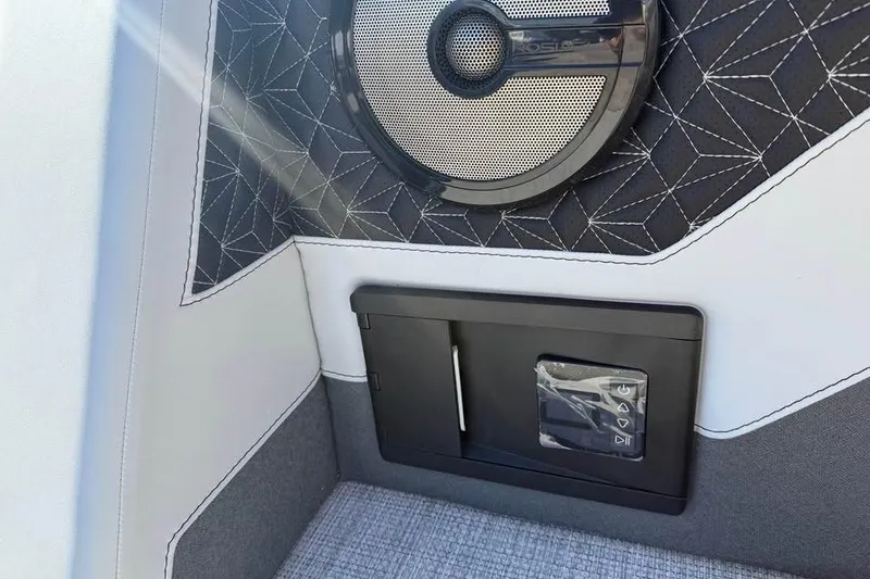 Slide: The Image of Interior detail of 2026 Alera M 25Q with speaker and control panel. - 16