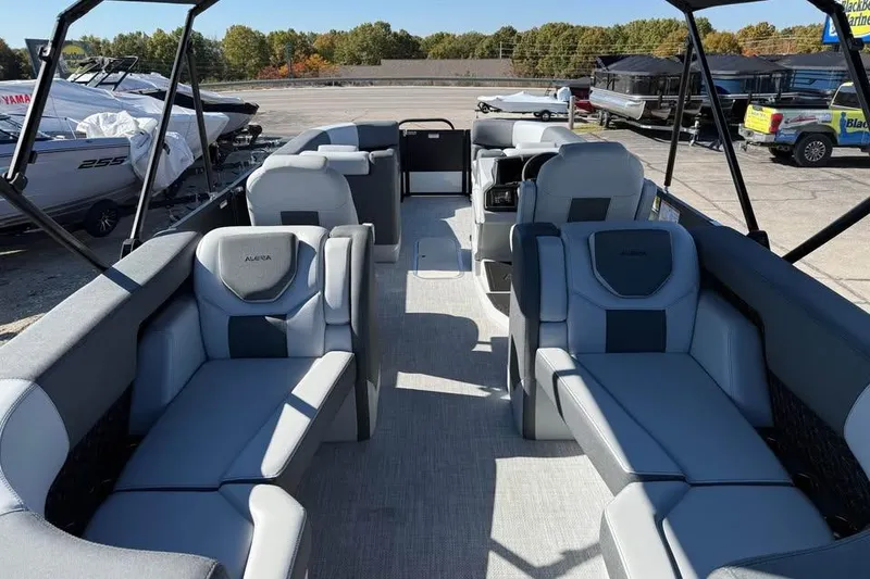 Slide: The Image of 2026 Alera M 25Q boat interior with modern seating and spacious layout. - 8