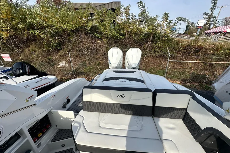 Slide: The Image of 2019 Monterey 305SS Super Sport boat with dual engines and luxurious seating. - 20