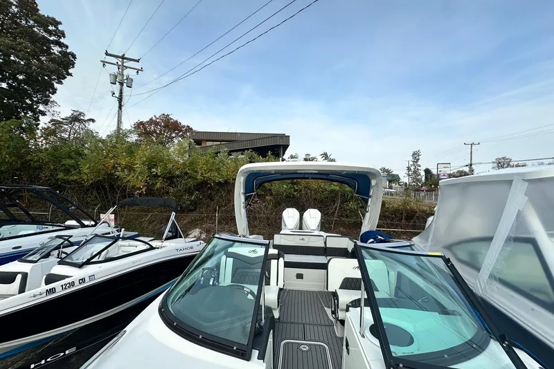 Slide: The Image of 2019 Monterey 305SS Super Sport boat interior with luxurious seating and sleek design. - 42