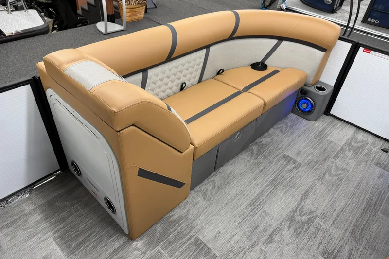 Slide: The Image of Luxurious seating on 2025 Crest Classic 220 boat with modern design and integrated speaker system. - 10
