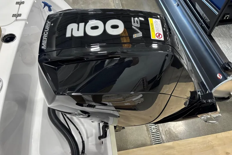 Slide: The Image of 2025 Sportsman Open 212 Center Console with Mercury V6 outboard engine. - 10