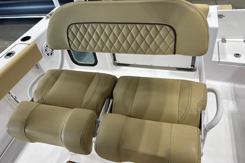 Slide: The Image of 2025 Sportsman Open 212 Center Console boat seats with diamond-stitched upholstery. - 7