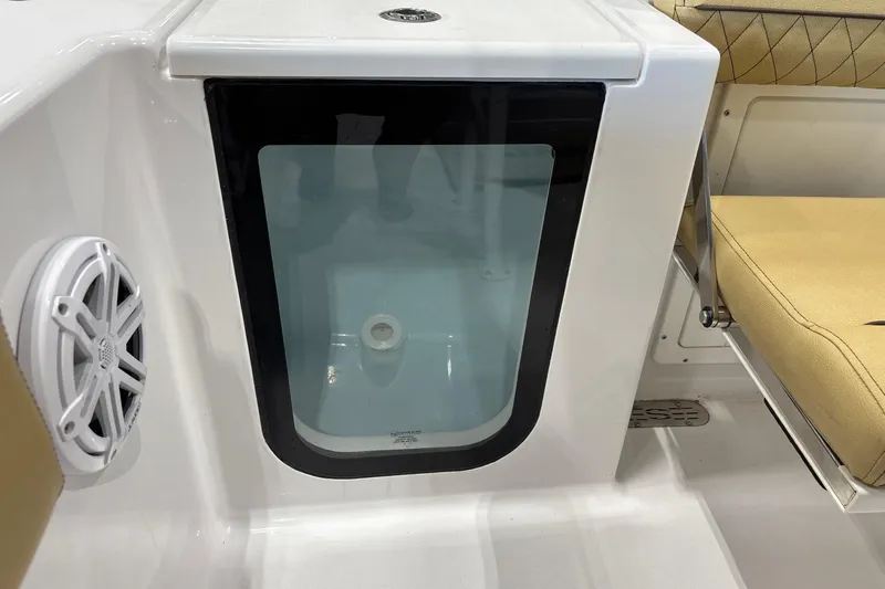 Slide: The Image of 2025 Sportsman Open 212 Center Console interior with speaker and seating detail. - 8