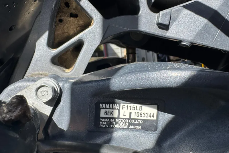 Slide: The Image of Close-up of a Yamaha F115LB engine on a 2020 Hell's Bay Marquesa boat. - 13