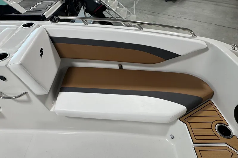 Slide: The Image of 2025 Starcraft SVX 171 OB boat interior with cushioned seating and modern design. - 7