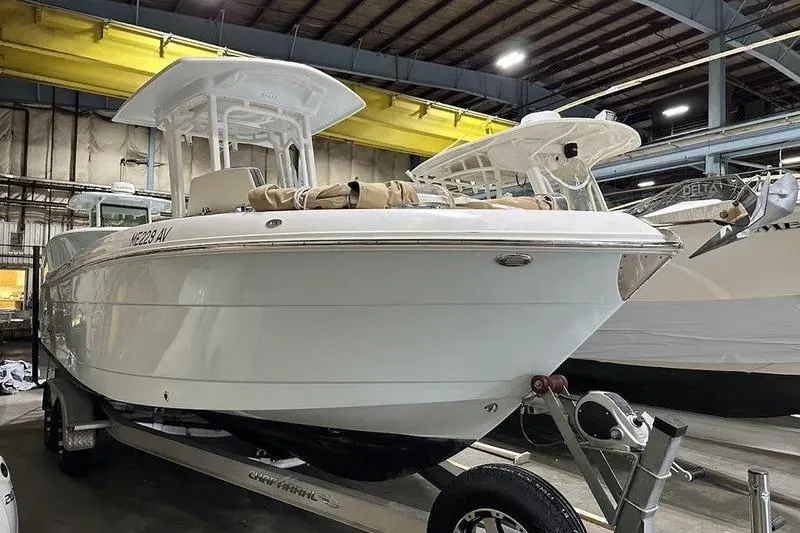 Slide: The Image of Outboard motor with duct tape repair on a 2018 Robalo R242 Explorer boat. - 10