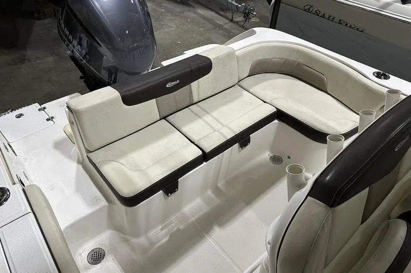 Slide: The Image of 2018 Robalo R242 Explorer boat interior with helm and seating. - 15