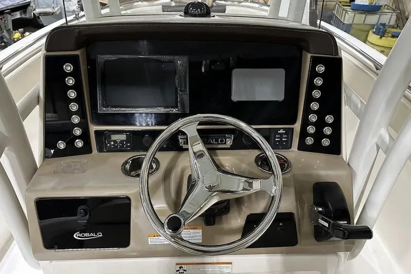 Slide: The Image of 2018 Robalo R242 Explorer boat with Yamaha outboard motor, interior view. - 17