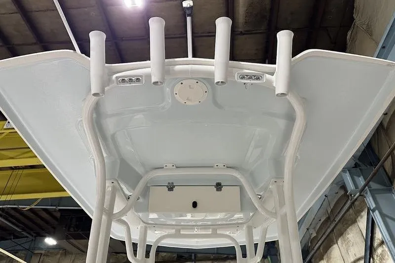 Slide: The Image of 2018 Robalo R242 Explorer boat interior with seating and control panel. - 22