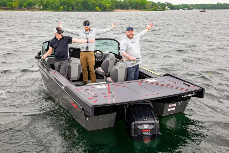 Slide: The Image of 2025 Alumacraft Trophy 185X Sport boat on display in showroom. - 3