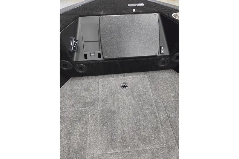 Slide: The Image of Interior of 2025 Alumacraft Trophy 185X Sport boat, featuring storage compartments. - 6