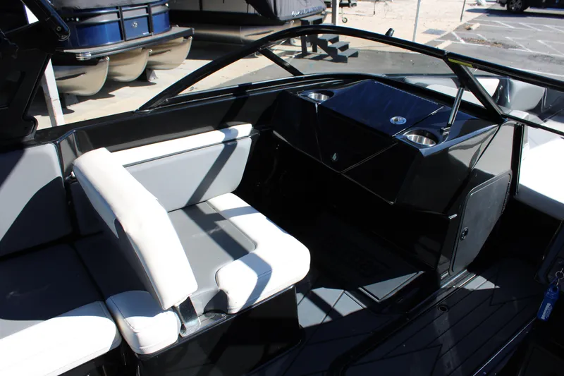 Slide: The Image of 2019 Heyday WTSurf boat interior with sleek seating and modern dashboard design. - 18