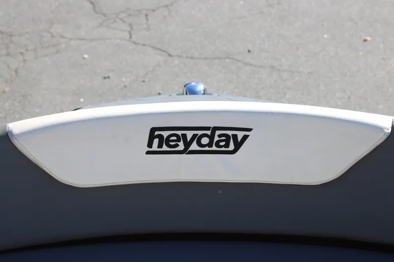 Slide: The Image of 2019 Heyday WTSurf boat with logo on white seat cushion. - 21