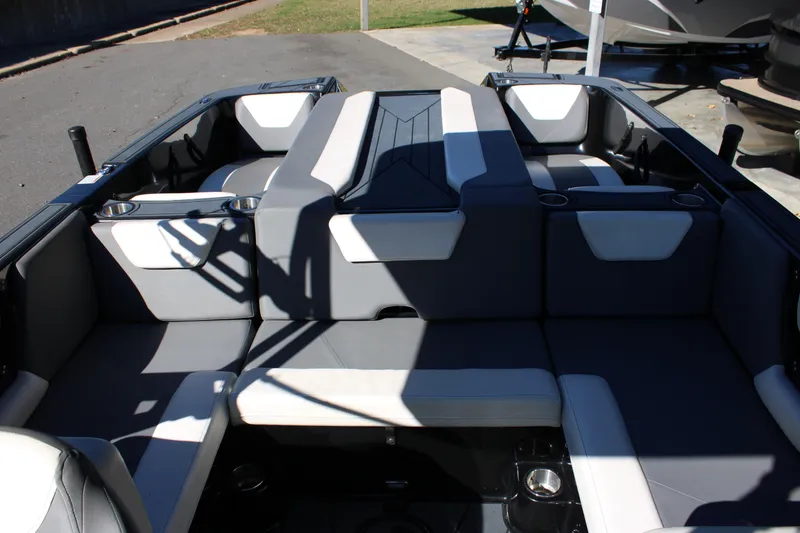 Slide: The Image of 2019 Heyday WTSurf boat interior with gray and white seating arrangement. - 22