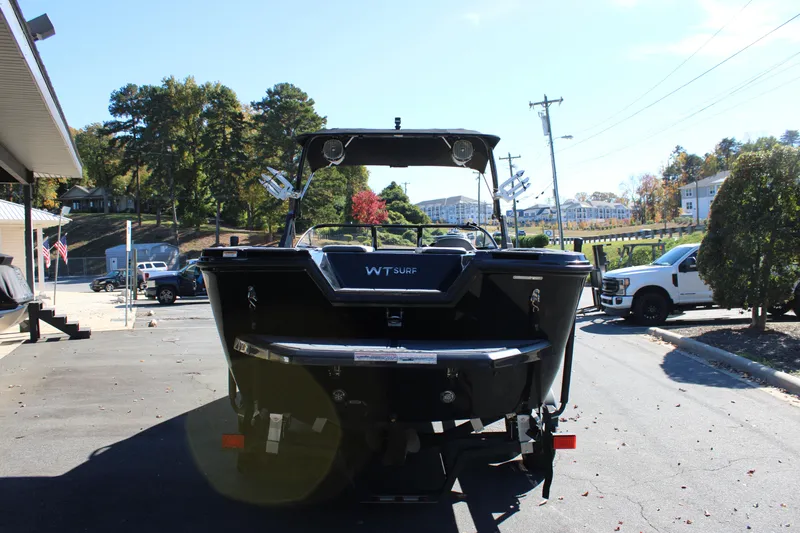 Slide: The Image of 2019 Heyday WTSurf boat parked outdoors on a sunny day. - 5