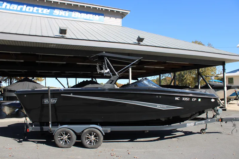Slide: The Image of 2019 Heyday WTSurf boat on trailer at Charlotte Ski Boats dealership. - 8