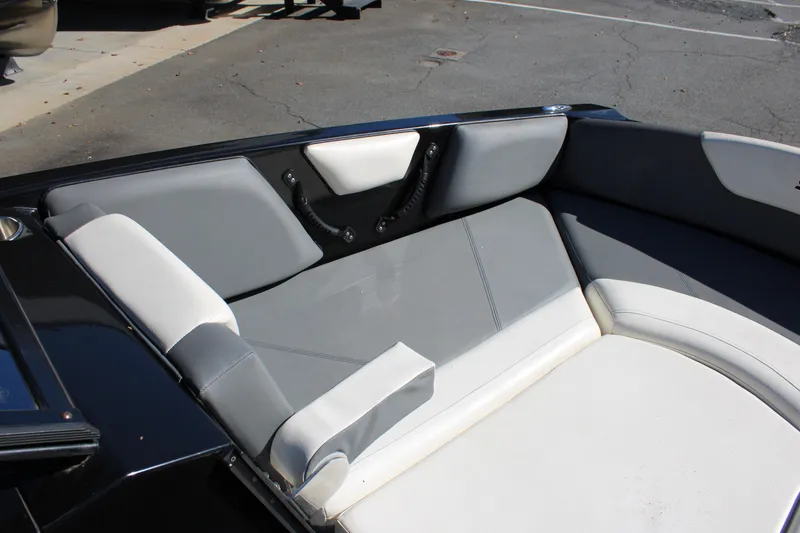 Slide: The Image of 2019 Heyday WTSurf boat interior with gray and white seating. - 20