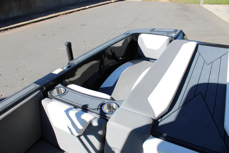 Slide: The Image of 2019 Heyday WTSurf boat interior with seating and cup holders. - 26