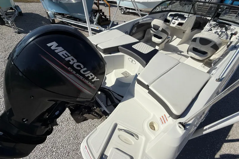 Slide: The Image of 2016 Tahoe 550TF boat interior with Mercury FourStroke engine, featuring comfortable seating. - 4