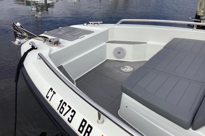 Slide: The Image of 2024 Quarken 27 T-Top V2 boat with sleek seating and modern design. - 23