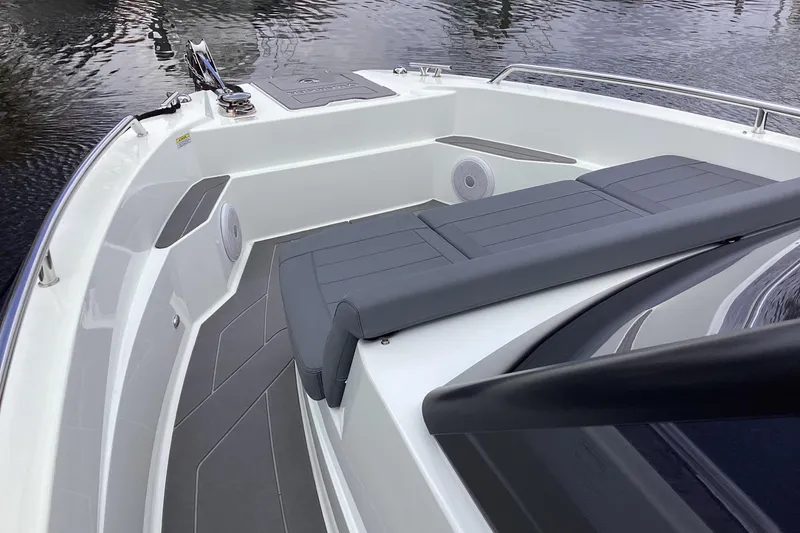 Slide: The Image of 2024 Quarken 27 T-Top V2 boat interior with sleek seating and modern design. - 32
