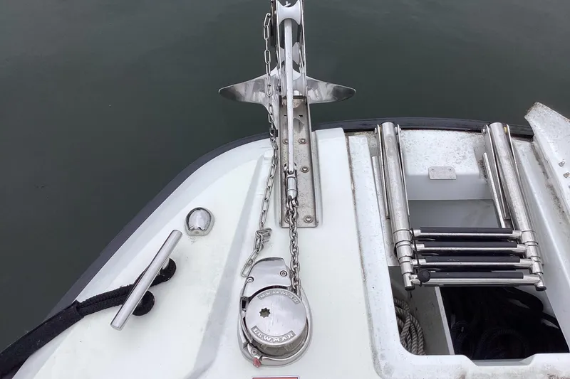 Slide: The Image of 2024 Quarken 27 T-Top V2 boat anchor and ladder detail. - 4