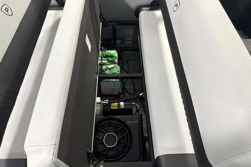 Slide: The Image of Interior view of 2026 Premier 230 Sunsation RL, showcasing under-seat storage and components. - 28