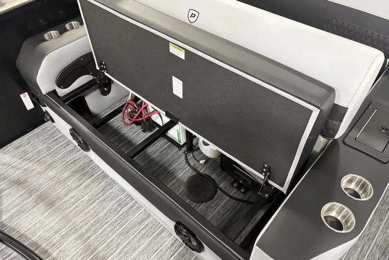 Slide: The Image of Interior view of 2026 Premier 230 Sunsation RL boat, showcasing seating and storage compartments. - 33