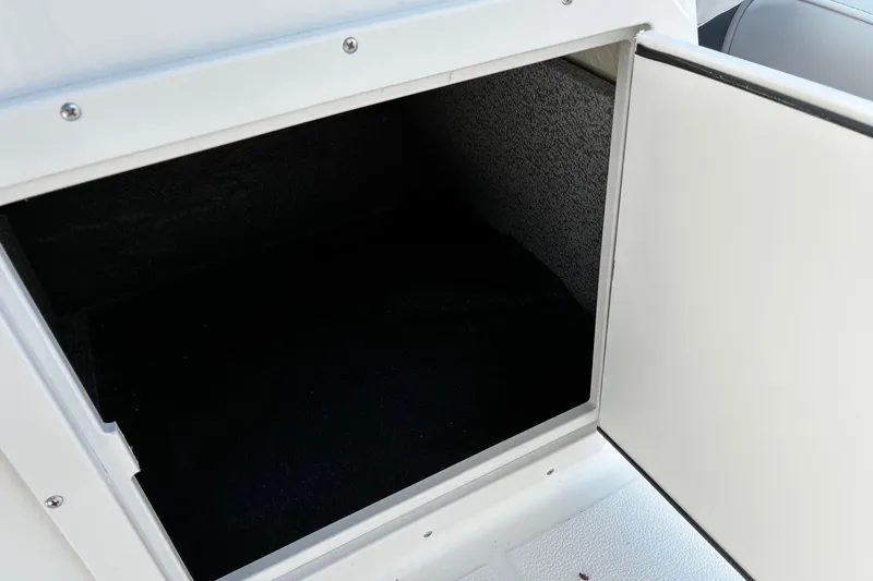 Slide: The Image of Open storage compartment on 2026 Starcraft SVX 191 OB boat. - 12