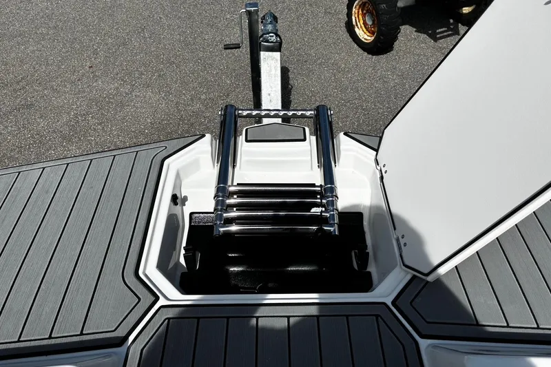 Slide: The Image of 2026 Starcraft SVX 191 OB boat ladder and deck, featuring sleek design and durable materials. - 16