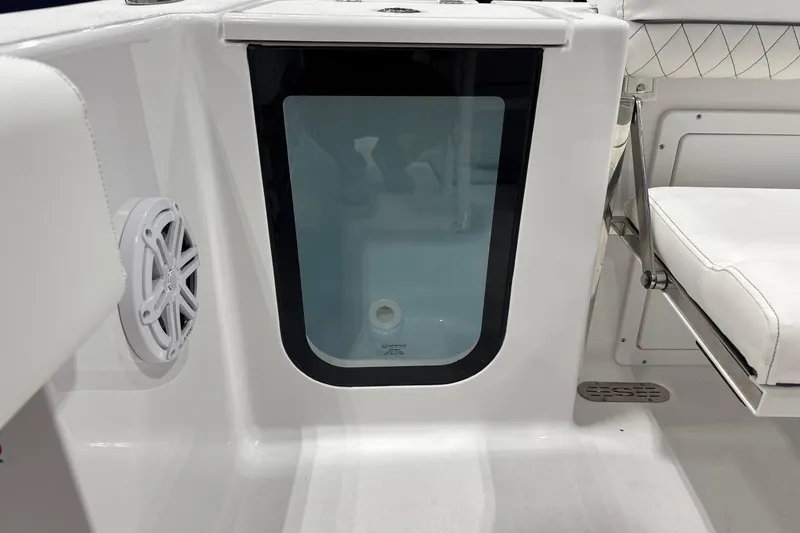 Slide: The Image of 2025 Sportsman Open 232 Center Console interior with speaker and seating detail. - 10