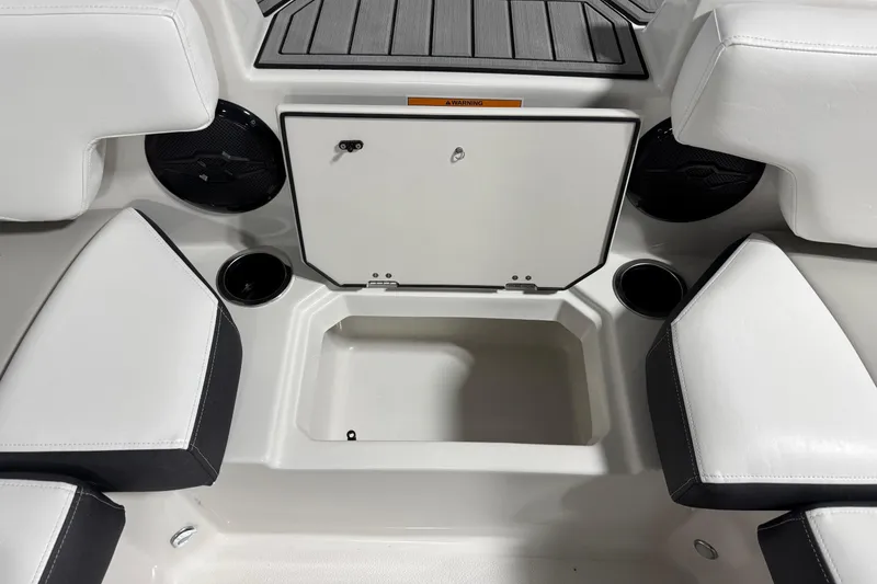 Slide: The Image of Interior of 2026 Starcraft SVX 191 OB boat with seating and storage compartment. - 13