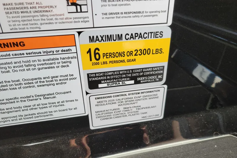 Slide: The Image of 2026 Supra SL boat capacity label: 16 persons or 2300 lbs, safety compliance details. - 12