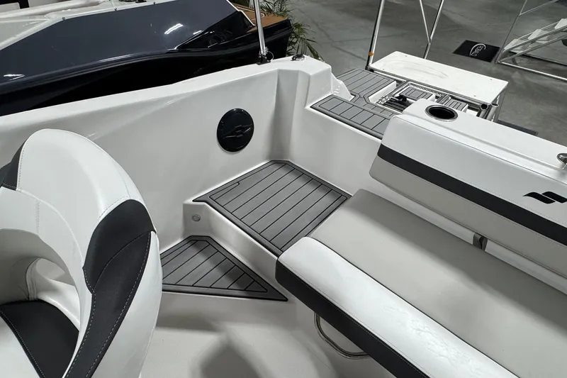 Slide: The Image of 2026 Starcraft SVX 191 OB boat interior with sleek seating and modern design. - 17