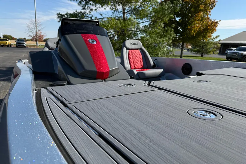 Slide: The Image of 2026 iKon LXE21 boat with sleek design, red accents, and comfortable seating. - 10
