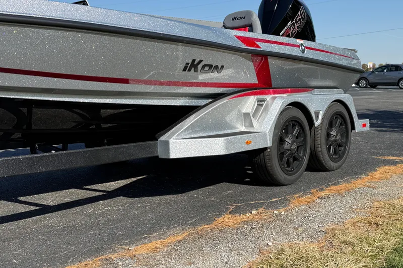 Slide: The Image of Silver and red iKon LXE21 boat on a trailer, 2026 model. - 9