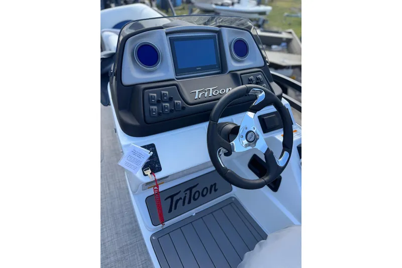 Slide: The Image of Steering console of 2026 JC 23 Neptoon TT Sport boat with modern controls. - 10