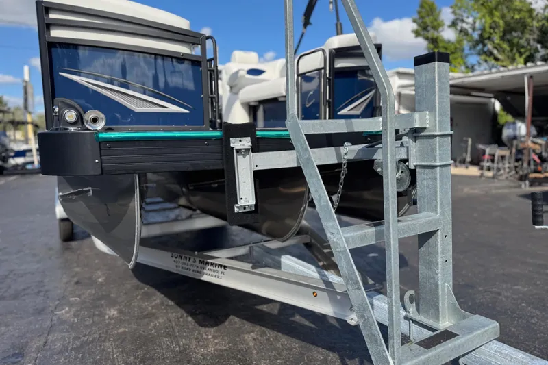 Slide: The Image of 2026 JC 23 Neptoon TT Sport boat on trailer, close-up view. - 9