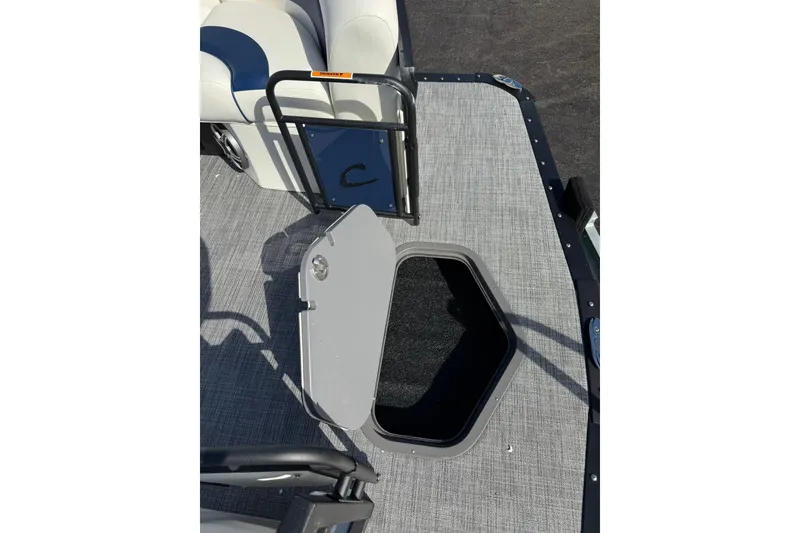 Slide: The Image of 2026 JC 23 Neptoon TT Sport boat deck with open storage hatch. - 16