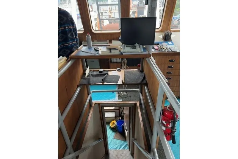 Slide: The Image of Interior of 1976 Halter Custom Built Mid-Water Trawler, featuring control room and equipment. - 10