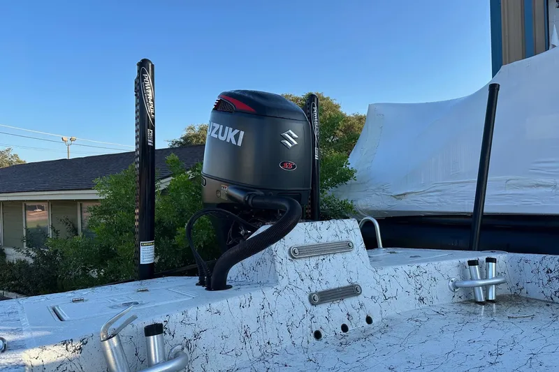 Slide: The Image of 2022 Dargel KAT 250DLX boat with Suzuki outboard motor and Power-Pole anchor system. - 4