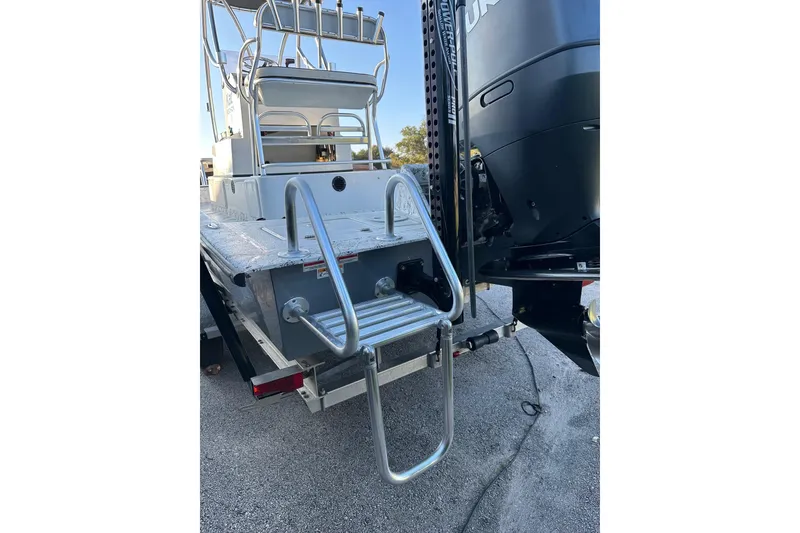 Slide: The Image of 2022 Dargel KAT 250DLX boat with ladder and outboard motor. - 7